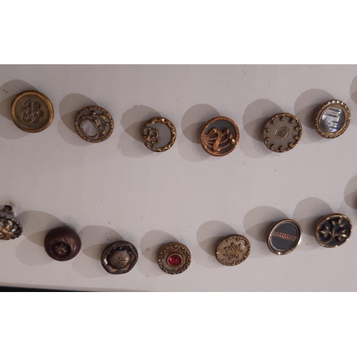 766 - A collection of 70 small metal Austrian Tinie buttons, late 19th to early 20th century, all 1 cm in ... 