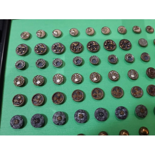 767 - A collection of late 19th to early 20th century small buttons comprising a framed display of enamell... 