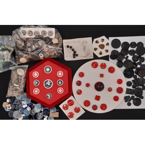 781 - A collection of 20th century buttons in casein and plastic, mostly Art Deco style in a range of colo... 