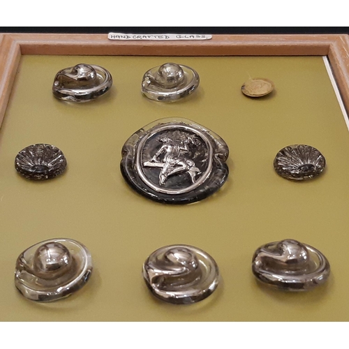 791 - A collection of mid-20th century British glass buttons including a round button by Bimini with the f... 