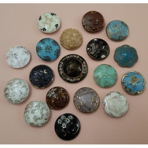 793 - A collection of 19th century and later glass buttons including mounted displays of ball shaped waist... 