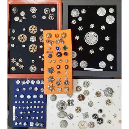 794 - A collection of antique and later crystal and paste buttons in various different settings and design... 