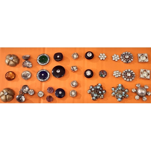 794 - A collection of antique and later crystal and paste buttons in various different settings and design... 