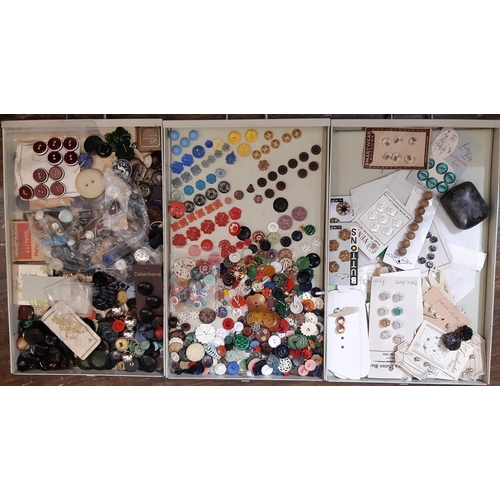 797 - A substantial collection of decorative19th - 20th century buttons housed in a 24-drawer lockable met... 