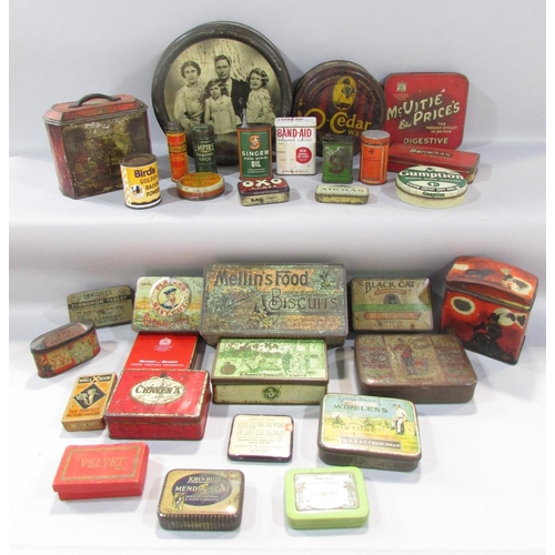 451 - A quantity of early 20th century advertisement tins.