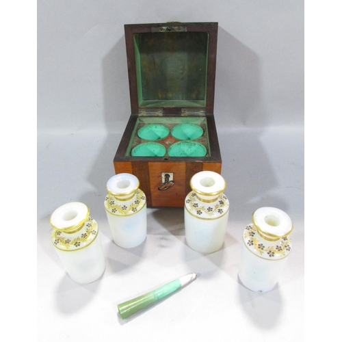 541 - A 19th century continental scent bottle box with a ring handle opening to reveal four opaque scent b... 