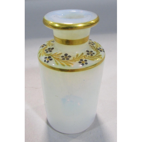 541 - A 19th century continental scent bottle box with a ring handle opening to reveal four opaque scent b... 