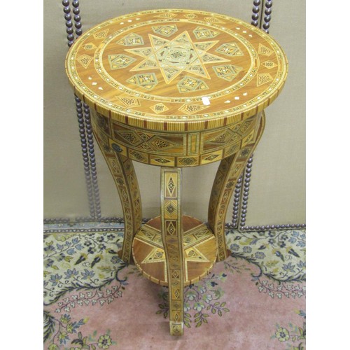 1361 - A two-tier Moroccan parquetry inlaid occasional table raised on three shaped supports, 88cm high, 48... 