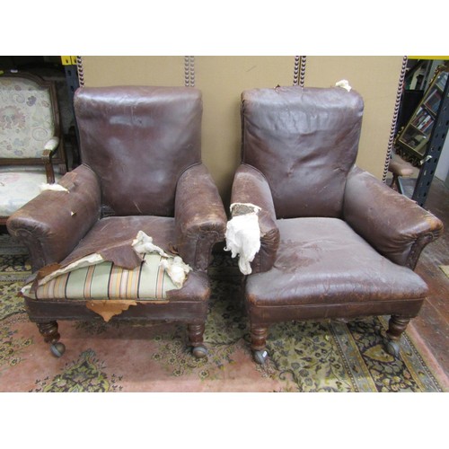 1362 - A pair of vintage leather club armchairs (for re-upholstery) (af)