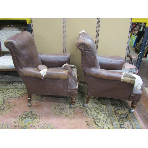 1362 - A pair of vintage leather club armchairs (for re-upholstery) (af)