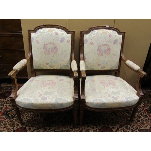 1363 - A pair of French open armchairs in walnut with acanthus and other detail