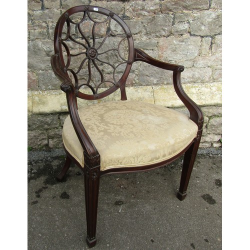 1373 - A late 19th century Hepplewhite style spider web elbow chair, the oval back supported by moulded and... 