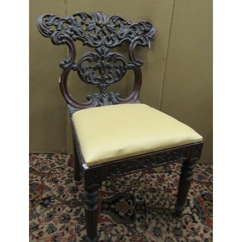 1374 - An early 19th century Anglo-Indian side chair the back with flamboyant carved detail, with drop in s... 