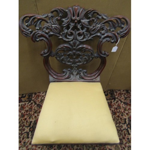 1374 - An early 19th century Anglo-Indian side chair the back with flamboyant carved detail, with drop in s... 