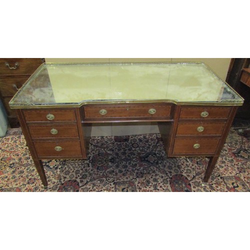 1375 - A late 19th century mahogany and inlaid inverted breakfront writing desk of nine drawers, on square ... 