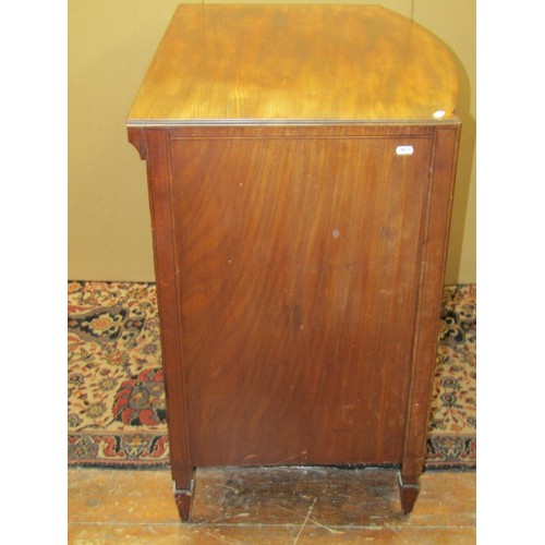 1378 - A Regency mahogany bow fronted chest of three long drawers, on square cut supports with brass plate ... 