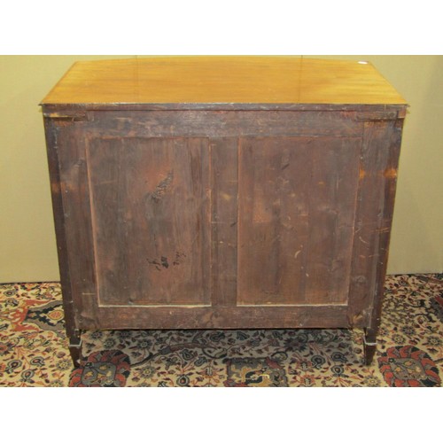 1378 - A Regency mahogany bow fronted chest of three long drawers, on square cut supports with brass plate ... 