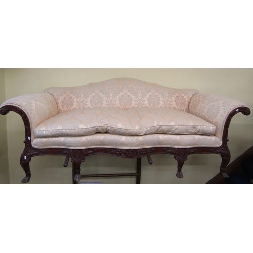 1469 - A large country house sofa with carved and moulded show wood frame and supports, acanthus, shells, w... 