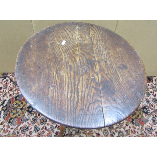 1474 - A Georgian cottage oak snap top table, the circular top 54cm diameter, raised on a turned pillar and... 