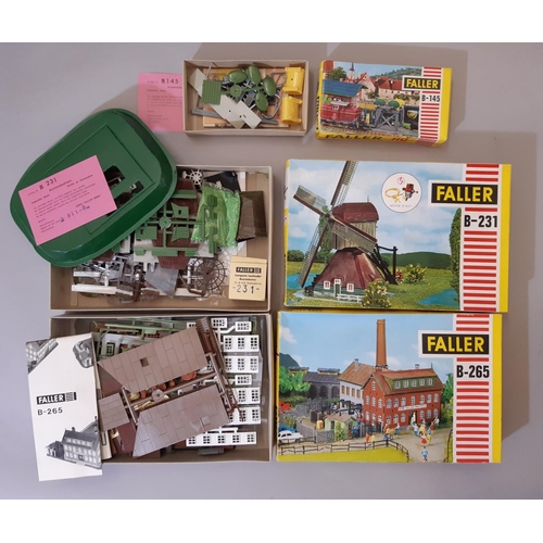 819 - 12 rail modelling kits of lineside buildings and accessories by Faller (11) and Aurora, all H0 gauge... 