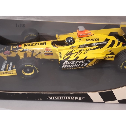 820 - Formula 1 interest: a Minichamps 1:18 scale boxed model Honda racing car signed by Damon Hill, a Lim... 