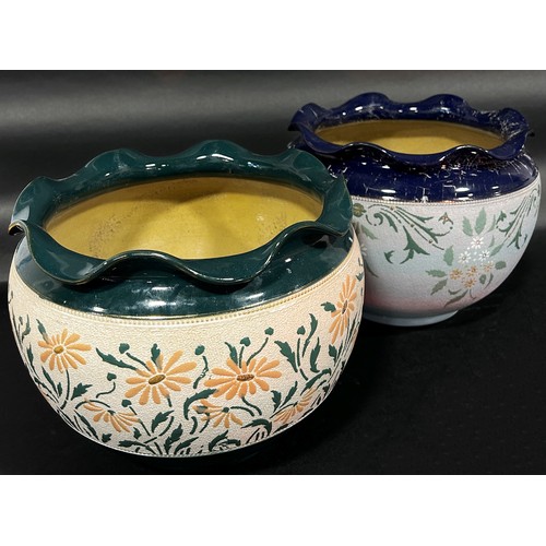 101 - Two Langley ware ceramic jardinières, one green/peach, the other blue/green, with repeating floral d... 