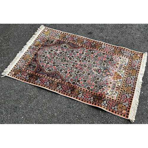 1494 - A small Persian prayer mat with an all over floral pattern, 130cm x 80cm, an old Bokhara carpet with... 