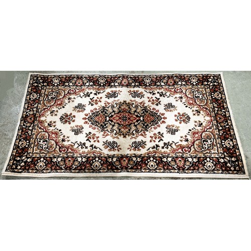 1499 - A modern machine made Persian style carpet in pink and brown tone on a cream ground, 180cm x 90cm ap... 