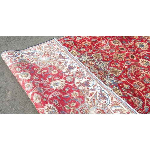 1511 - A vintage Persian Nafabad with all over floral design in reds and blues, 315cm x 174cm