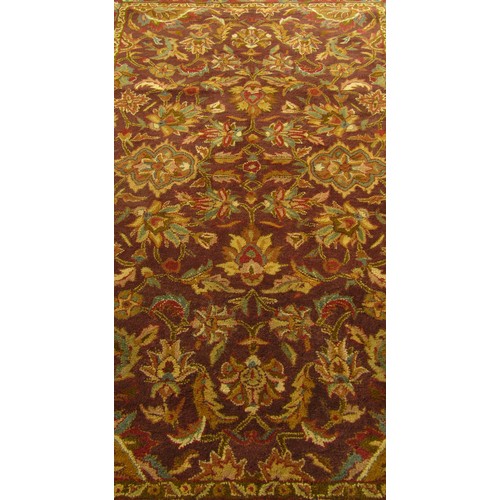 1529 - An Indian Jaipur carpet with an all over floral pattern, 252cm x 160cm