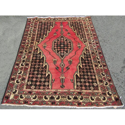 1530 - A Persian Hamadan carpet with washed red ground, fine woven pile with a central medallion, 195cm x 1... 