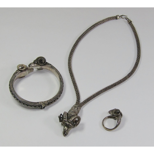 367 - Classical Greek style silver rams head jewellery suite, comprising pendant necklace, ring and hinged... 