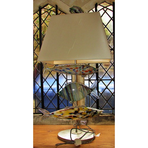 130 - An unusual mid-century Murano glass fish lamp, with three fish swimming below the square cut shade a... 