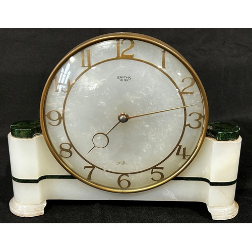 447 - A small Smiths ‘Sectric’ mantle clock in the Art Deco style, the white polished alabaster case bande... 