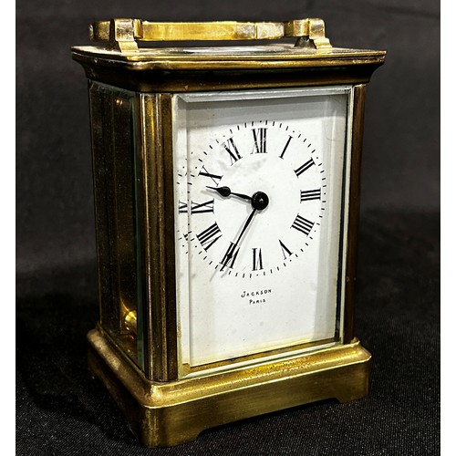 450 - Jackson of Paris, a brass cased carriage clock.