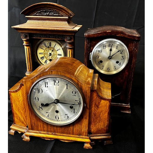 448 - An Art Deco style walnut cased mantle clock, together with two others (3)