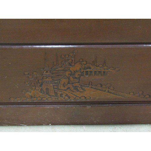 1064 - A Chinese style camphor wood coffer with carved ships approaching land, 93cm wide x 46cm deep, x 40c... 