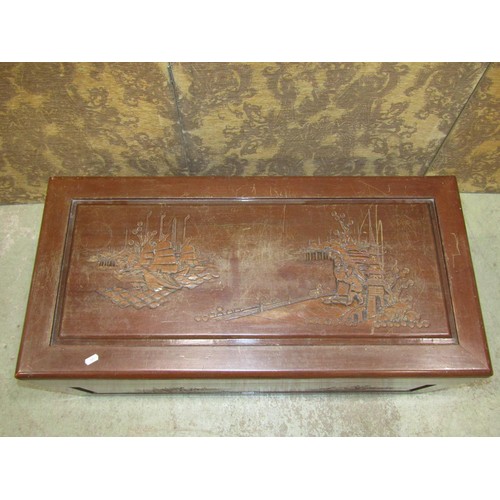 1064 - A Chinese style camphor wood coffer with carved ships approaching land, 93cm wide x 46cm deep, x 40c... 