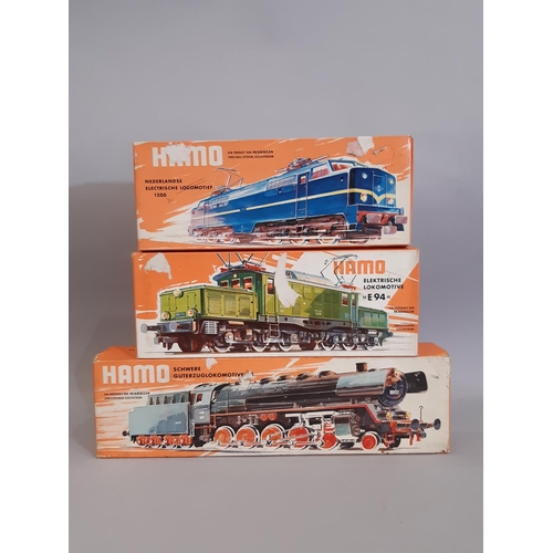 812 - Three HO gauge boxed locomotives by Hamo / Marklin, all 2-rail electric,  including 8347 heavy goods... 