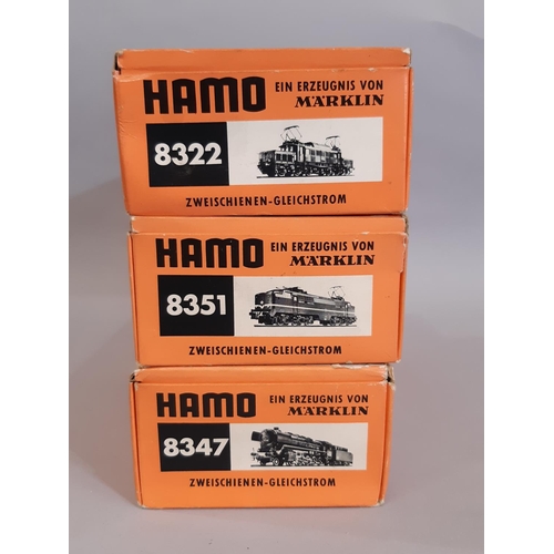 812 - Three HO gauge boxed locomotives by Hamo / Marklin, all 2-rail electric,  including 8347 heavy goods... 