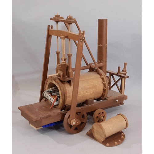 825 - Working scratch-built model of an early steam locomotive, all hand made in teak with switch operated... 