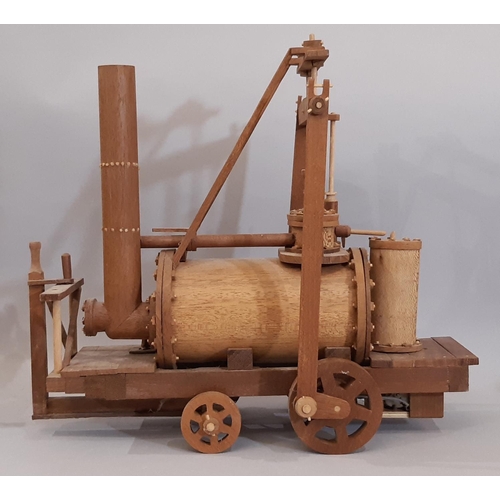 825 - Working scratch-built model of an early steam locomotive, all hand made in teak with switch operated... 