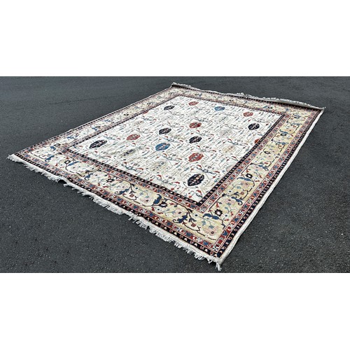 1519 - A Ziegler design carpet with an all over Art Nouveau floral pattern on an ivory field, 295cm x 250cm... 