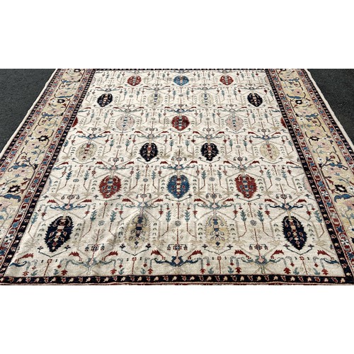 1519 - A Ziegler design carpet with an all over Art Nouveau floral pattern on an ivory field, 295cm x 250cm... 