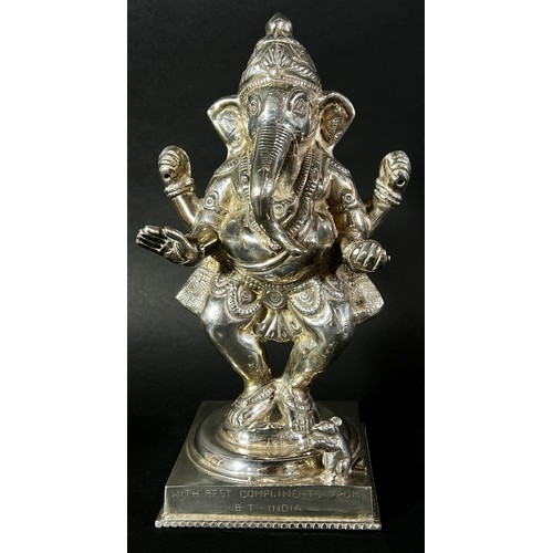 183 - An Indian silver figure of the deity Ganesha with his Vahana, a rat sat in front, raised on a square... 