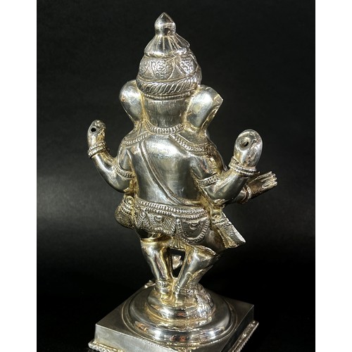 183 - An Indian silver figure of the deity Ganesha with his Vahana, a rat sat in front, raised on a square... 