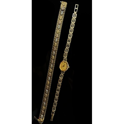 424 - Accurist, a lady’s 9ct yellow gold cased wristwatch together with an Italian silver gilt tri-colour ... 