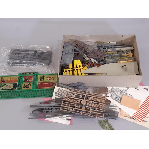 817 - A quantity of railway modelling items mainly by Marklin, including a  tin plate engine shed/ roundho... 