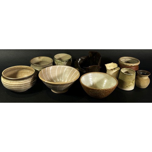 117 - A large quantity of Studio Pottery ware comprising mugs, open bowls, etc including works by Steve Mi... 