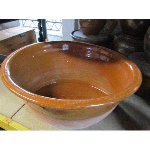 1055 - An oval glazed terracotta planter with side handles 53cm x 50cm together with, ten further stone gla... 